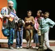 Fishy with kids in Iraq’s National Theatre (clicky)